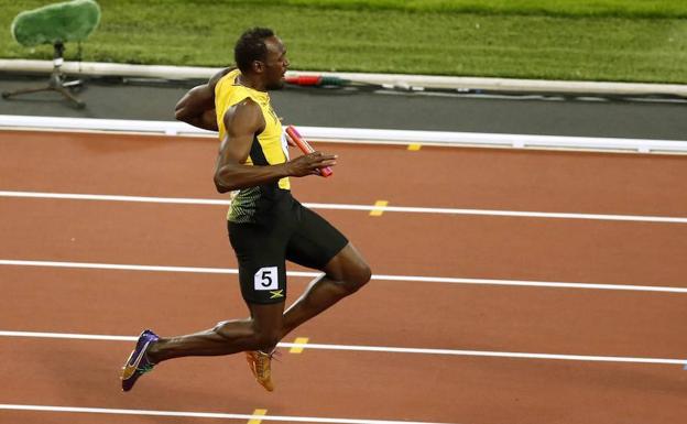 Usain Bolt, lesionado en su última carrera./Reuters