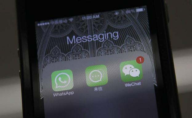 Un terminal con varios servicios de mensajería instalados. /Barry Huang (Reuters)