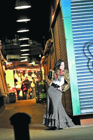 Estilo propio. La Bien Querida, retratada en el mercado barcelonés de La Boquería. ::
VICENS GIMÉNEZ/