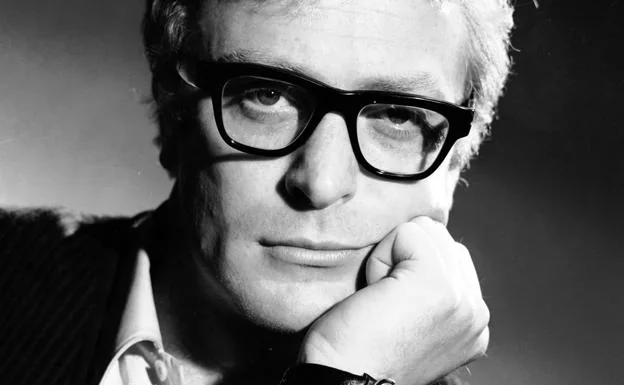Michael Caine and his iconic glasses in a photo of youth.