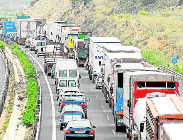 Crowded trucks driving on the A-7 highway in a file photo. 