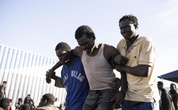 Image of some of the immigrants who managed to jump the Melilla fence yesterday. 