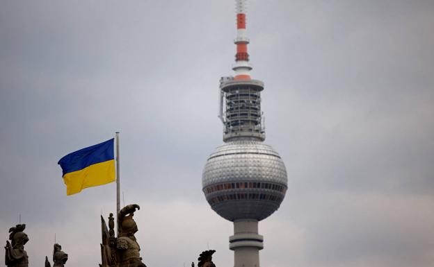 The flag of Ukraine, next to the communication tower in Berlin.