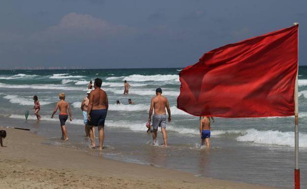 Red flag on a beach.