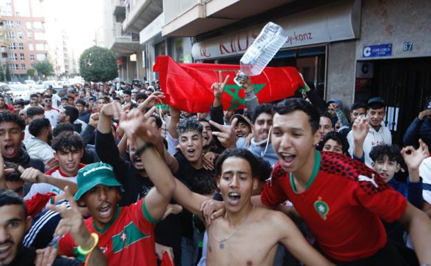 A group of young people celebrate Morocco's victory in the World Cup. 